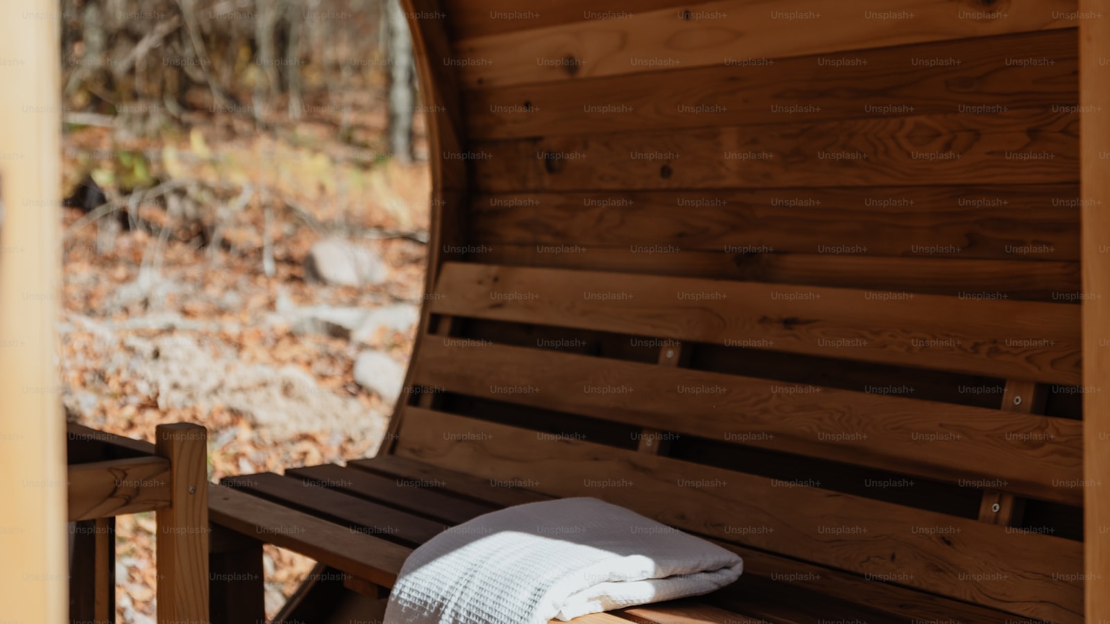 Wooden bench inside a compact sauna